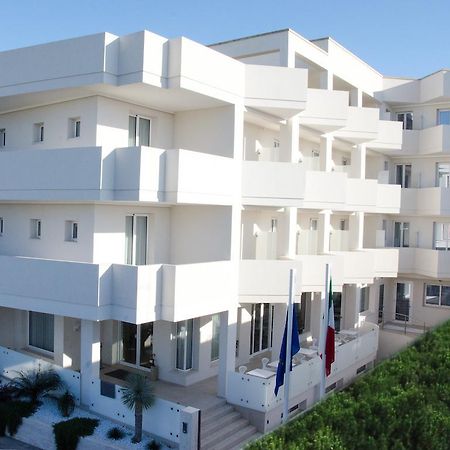 Quihotel Porto Cesareo Bagian luar foto