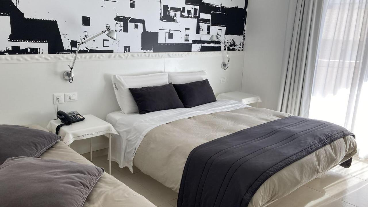 Quihotel Porto Cesareo Bagian luar foto