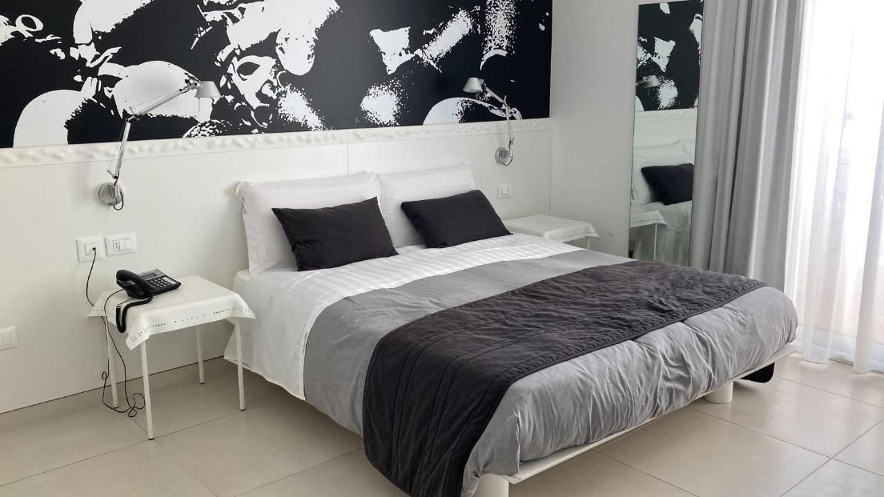 Quihotel Porto Cesareo Bagian luar foto