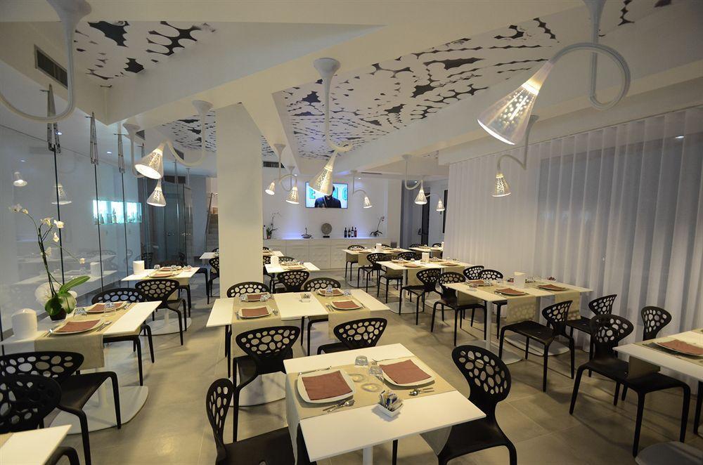 Quihotel Porto Cesareo Bagian luar foto
