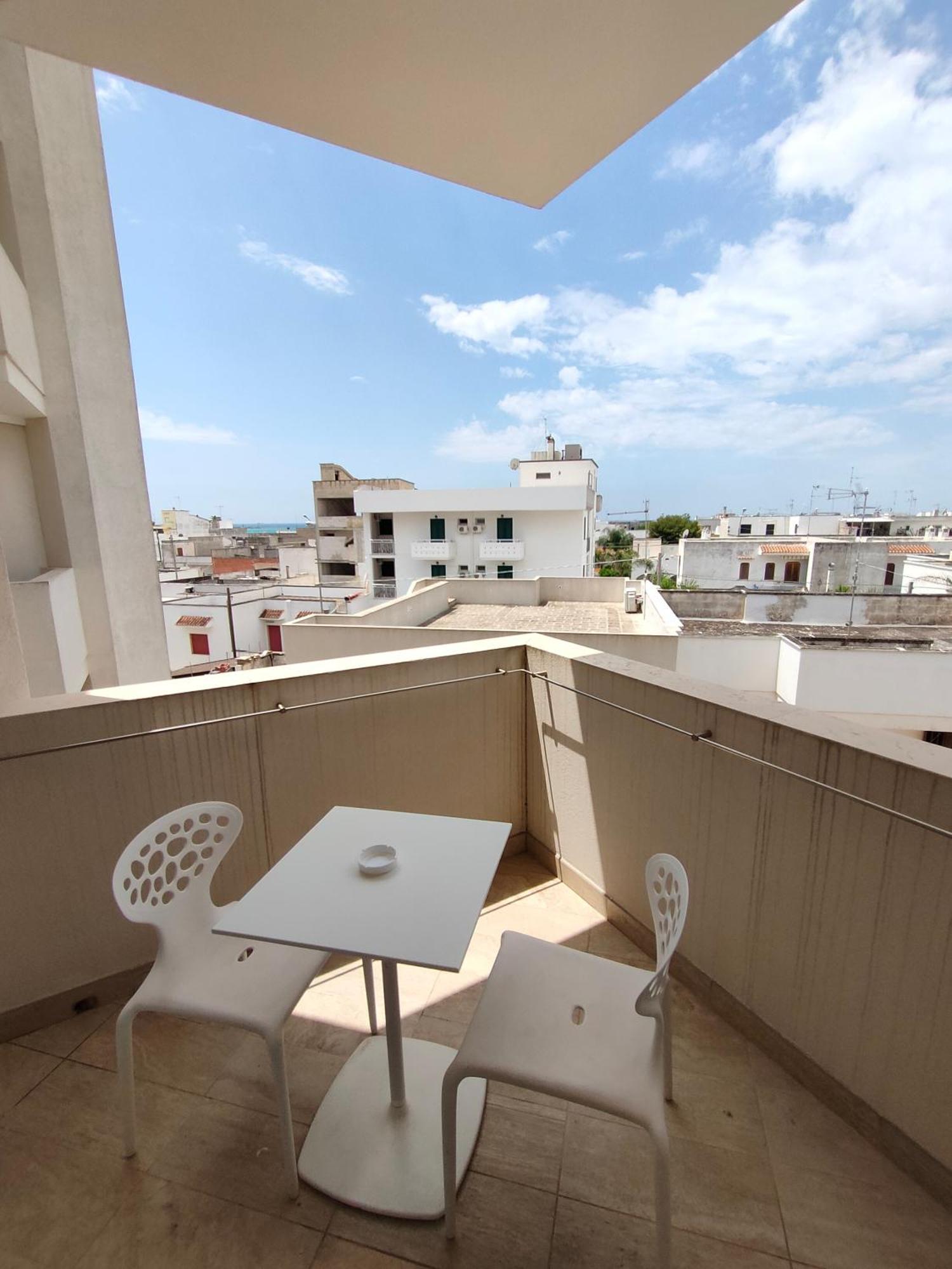 Quihotel Porto Cesareo Bagian luar foto