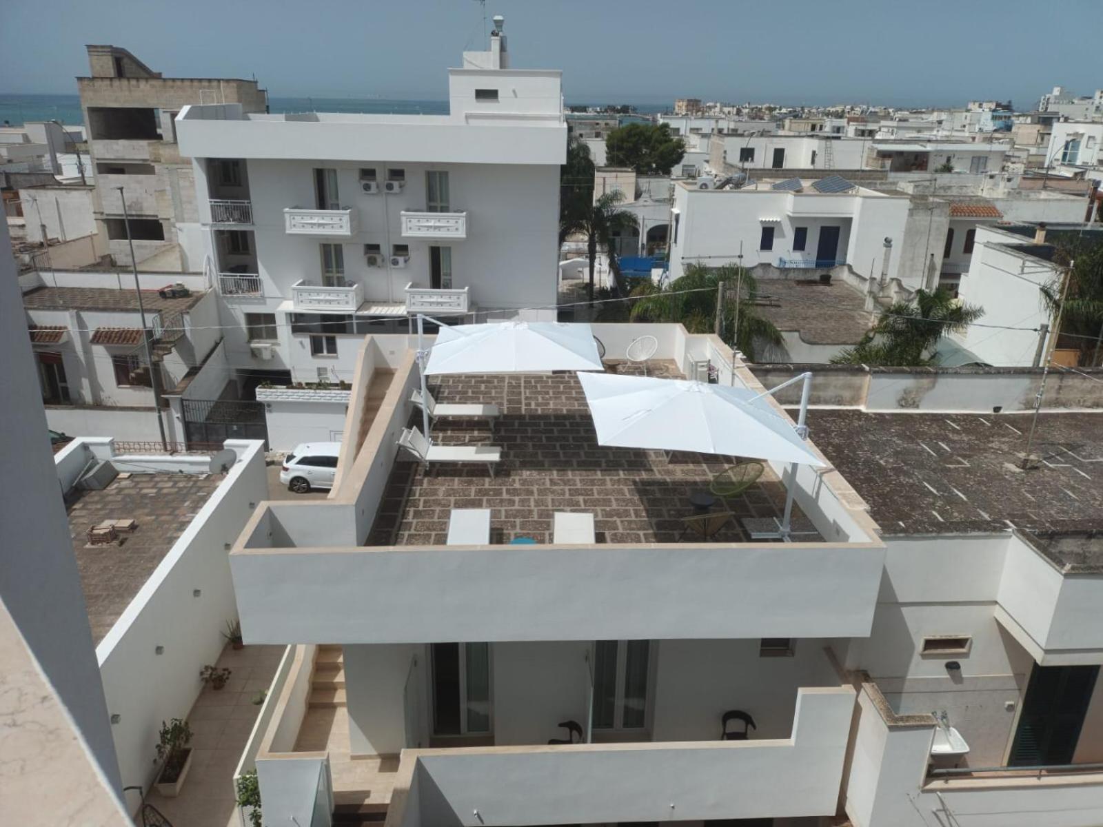 Quihotel Porto Cesareo Bagian luar foto