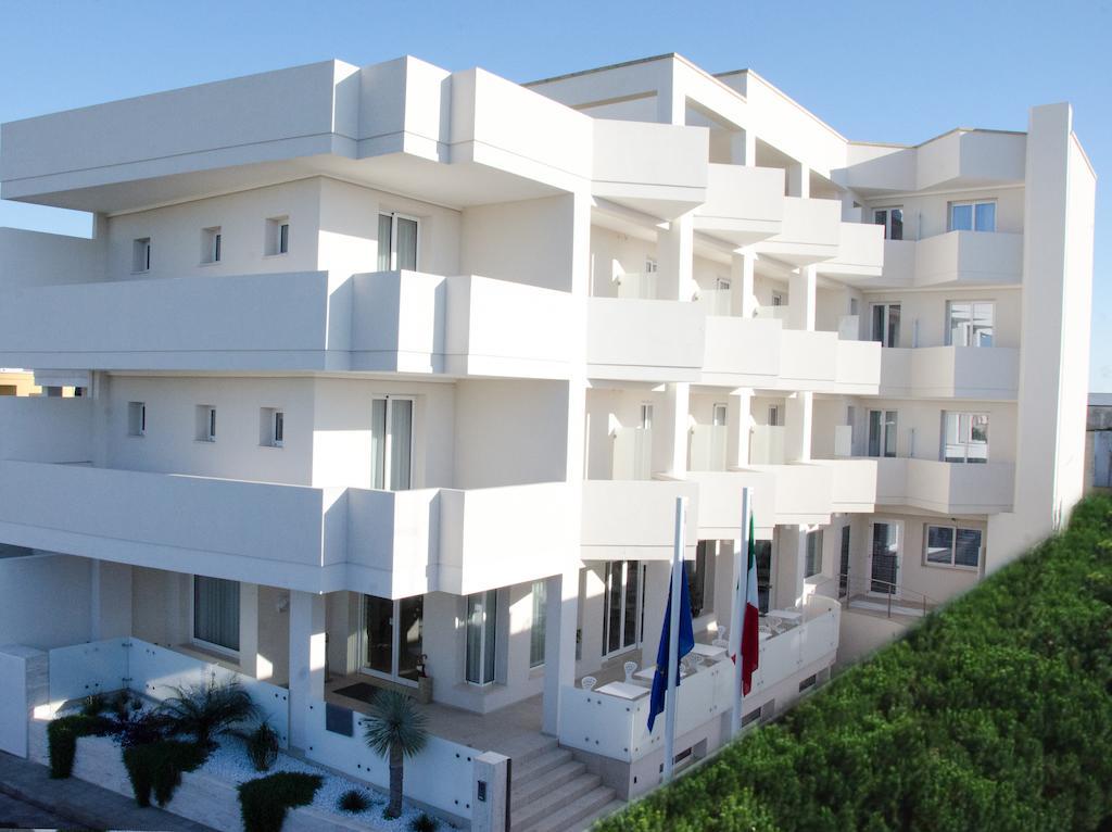 Quihotel Porto Cesareo Bagian luar foto