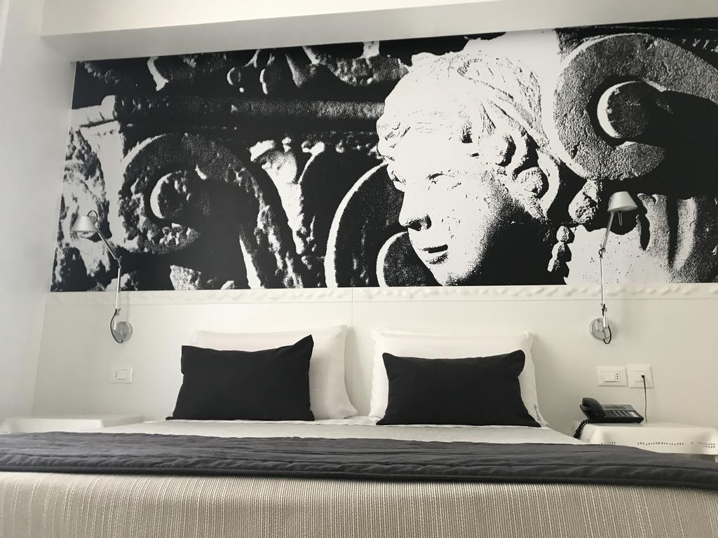 Quihotel Porto Cesareo Bagian luar foto