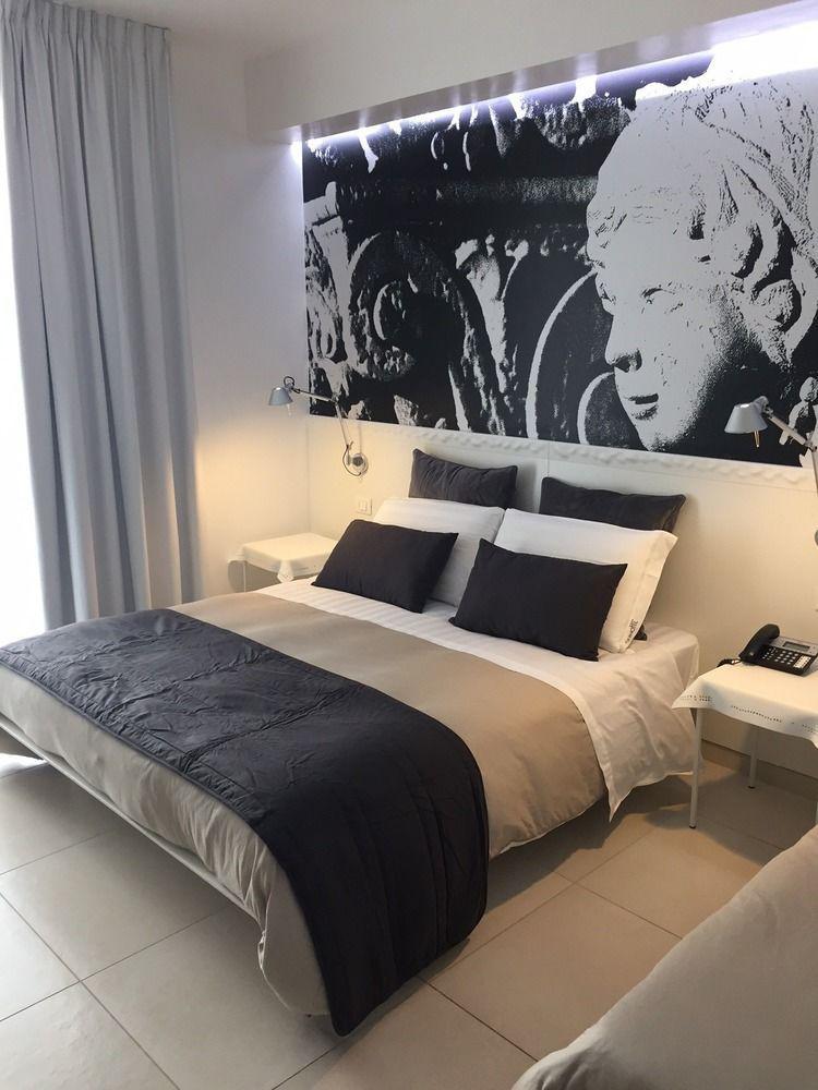 Quihotel Porto Cesareo Bagian luar foto