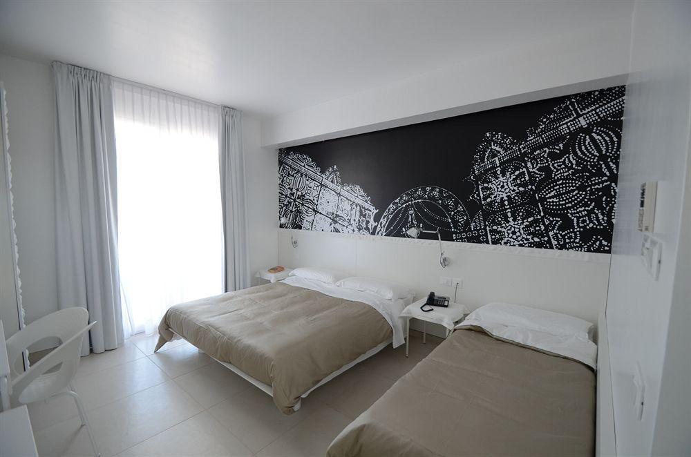 Quihotel Porto Cesareo Bagian luar foto