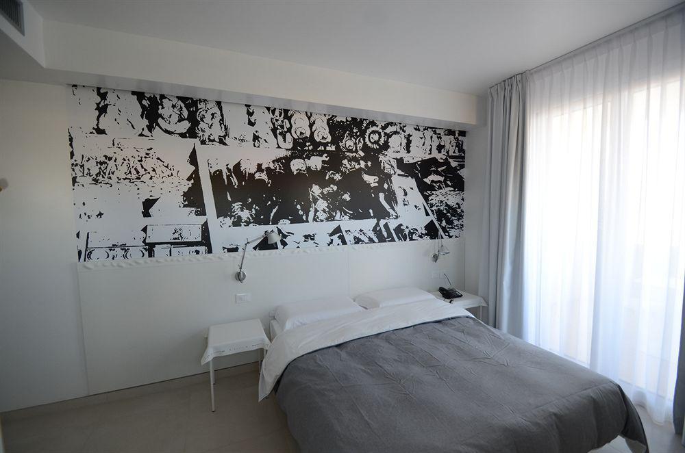 Quihotel Porto Cesareo Bagian luar foto