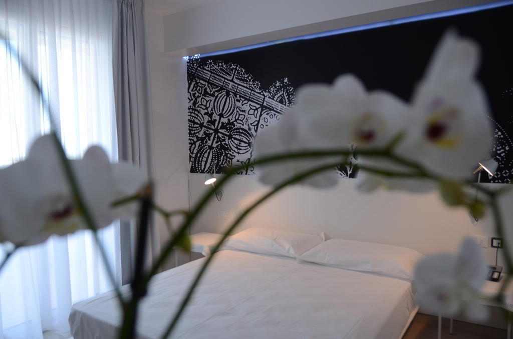 Quihotel Porto Cesareo Bagian luar foto