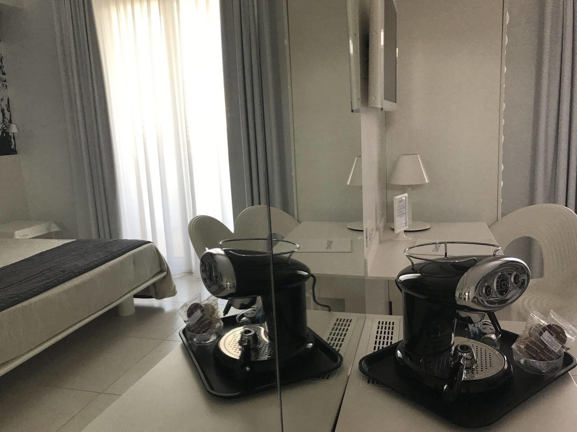 Quihotel Porto Cesareo Bagian luar foto